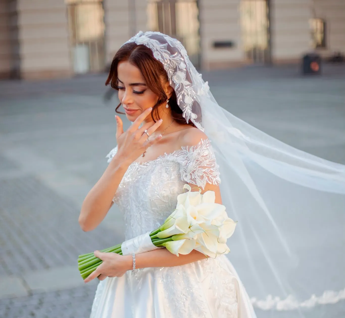 Bride holding a bouquet during a wedding photoshoot